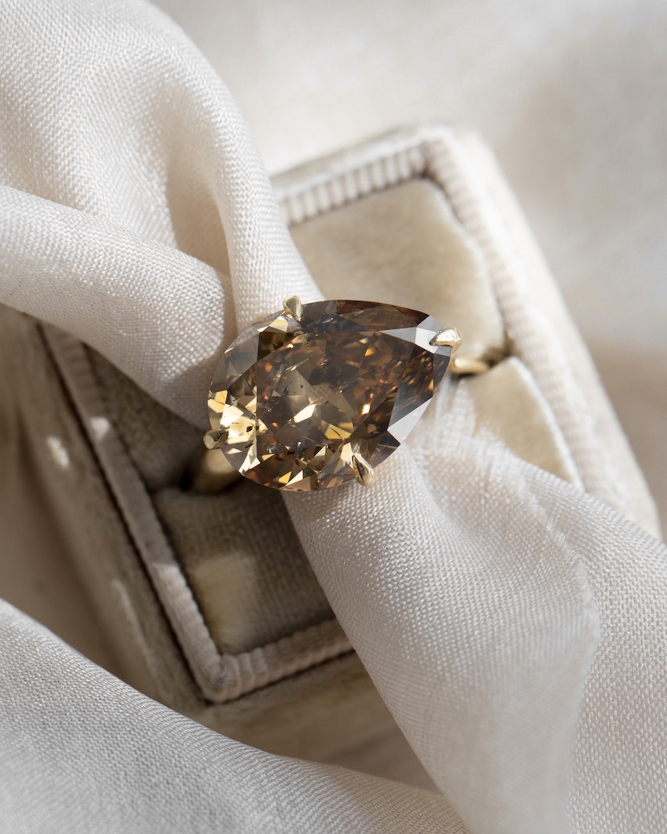 unique engagement ring, pear shape diamond ring