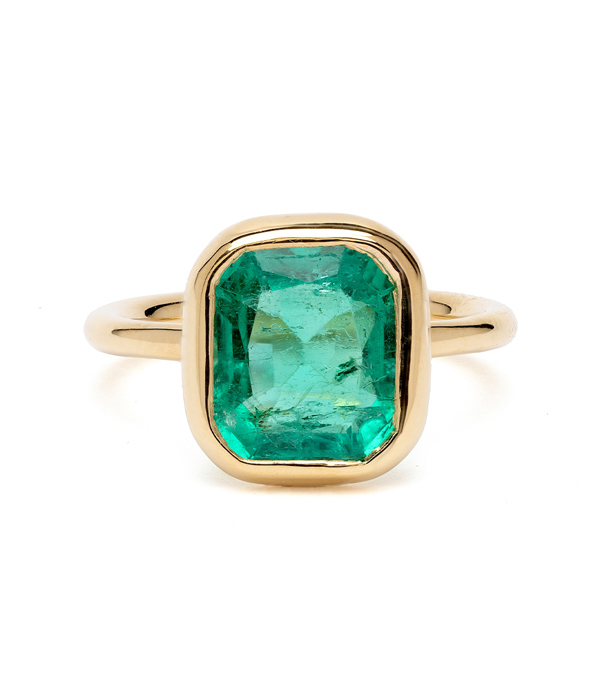 3 Carat Antique Emerald Set in 14K Shiny Yellow Gold Bezel. Just Another Beautiful Example of our Unique Engagement Rings designed by Sofia Kaman handmade in Los Angeles using our SKFJ ethical jewelry process.